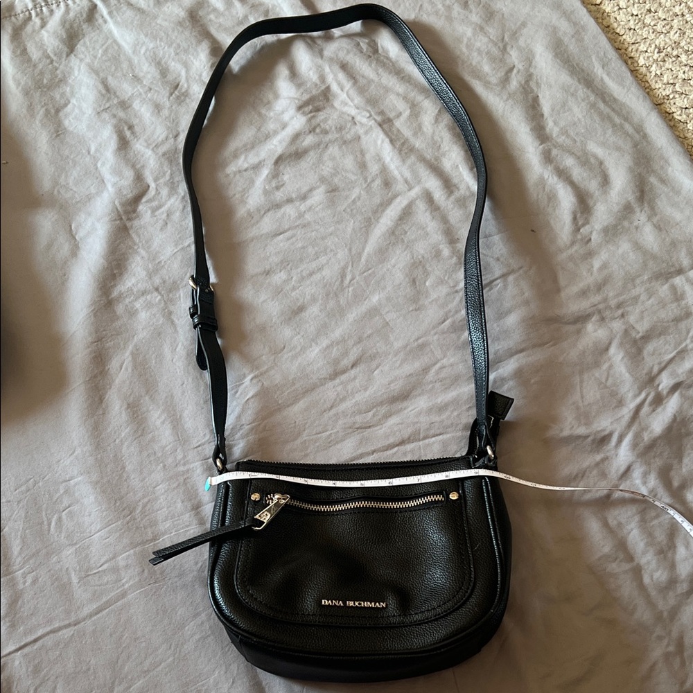 Dana Buchman faux pebble black leather crossbody bag with adjustable strap.